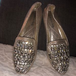 Beautiful silver flats designed with bright rhinestones.